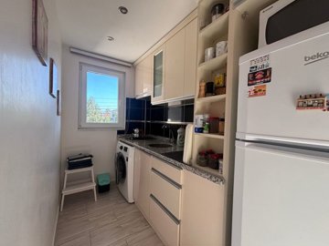 Beautifully Maintained 1-Bed Apartment For Sale In Gulpinar, Dalyan - Renovated fully equipped kitchen