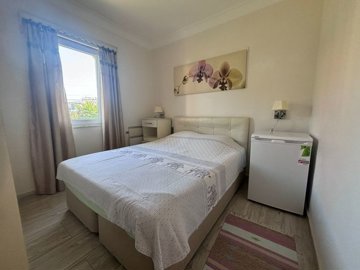 Beautifully Maintained 1-Bed Apartment For Sale In Gulpinar, Dalyan - Large double bedroom