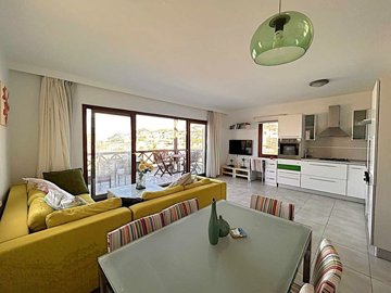Beautiful Sea-View Apartment For Sale In Bodrum – Living area with access to the large sea view balcony