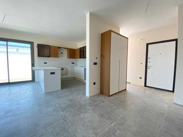 Desirable Apartments & Villas In Yalikavak, Bodrum – View to the kitchen from the lounge area