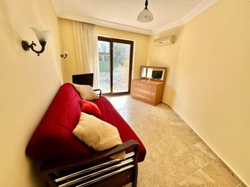 A Detached Villa For Sale In Seydikemer, Fethiye - First bedroom, currently used as a second seating lounge