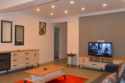 An Immaculate Fethiye Investment Property For Sale - The lounge area fully furnished with spotlighting and air conditioning