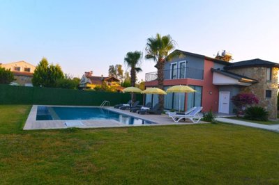 An Immaculate Fethiye Investment Property For Sale - Vast private garden and sun terrace surrounding the large private pool