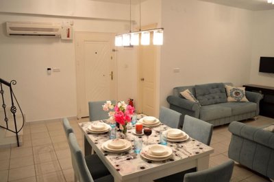 Enticing Villa With A Private Pool For Sale in Antalya - Dining area to the lounge