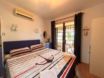 Luxury Property For Sale In Yalikavak Centre - Double bedroom with outdoor access
