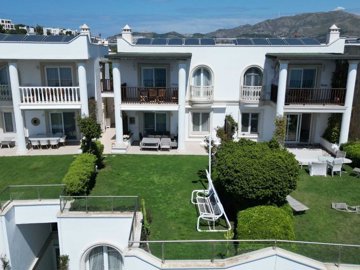 Idyllic Sea View Apartment In Gumusluk, Bodrum For Sale – A garden apartment with stunning sea views