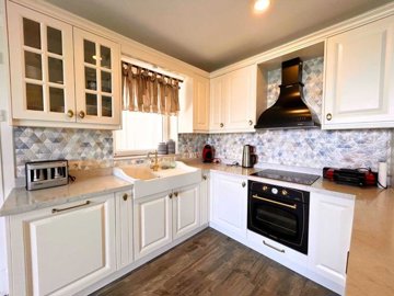 Idyllic Sea View Apartment In Gumusluk, Bodrum For Sale – Modern kitchen with built-in appliances