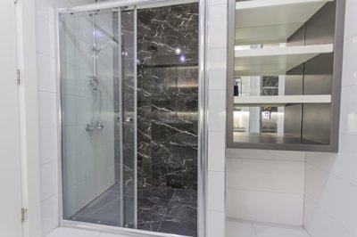 Immaculate Apartment For Sale In Alanya - Modern shower and storage