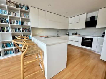 Sea-View Property For Sale In Fethiye - Kitchen with a breakfast bar