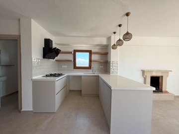 Attractive Duplex Bodrum Villa For Sale - Modern kitchen with stove and extractor