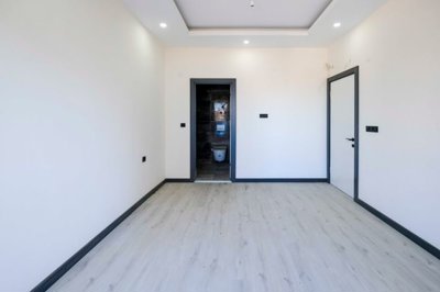 Beautiful Alanya Property For Sale in Mahmutlar - First bedroom, ensuite shower