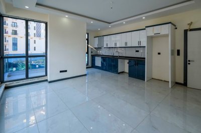 Beautiful Alanya Property For Sale in Mahmutlar - Lounge and kitchen