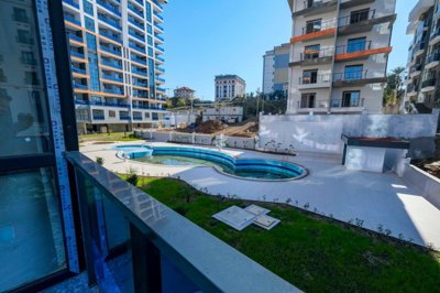 Beautiful Alanya Property For Sale in Mahmutlar - Balcony with pool views