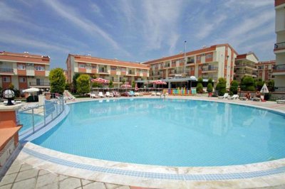 A Beautifully Renovated Apartment For Sale In Didim - Large communal swimming pool