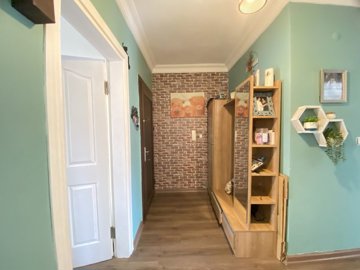 A Beautifully Renovated Apartment For Sale In Didim - Entrance to the apartment