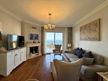 Bodrum Seafront Property For Sale In Kadikalesi - Lounge with balcony access