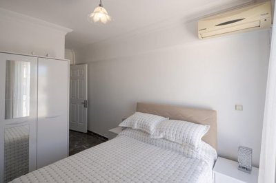A Flawless Detached Triplex Villa For Sale In Akbuk – Double bedroom with balcony