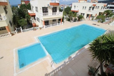 A Flawless Detached Triplex Villa For Sale In Akbuk – Views down over the shared pool