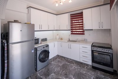 A Flawless Detached Triplex Villa For Sale In Akbuk – Modern, fully fitted kitchen