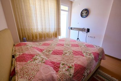 Seafront Apartment in Mahmutlar, Alanya For Sale - Bedroom with balcony
