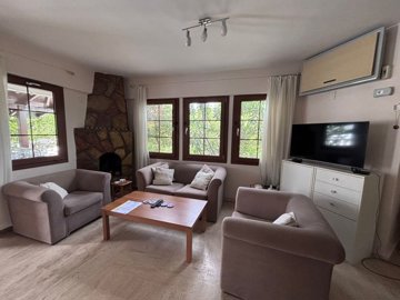 Charming Triplex  Villa For Sale In Dalyan - Spacious lounge with fireplace