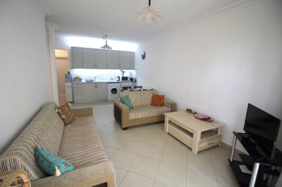 A Great Value Didim Apartment For Sale – Lounge to the kitchen