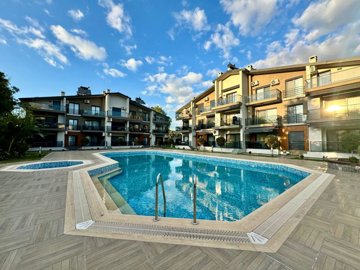 Blissful Property For Sale Near The Beach In Fethiye - Large shared pool and sun terraces