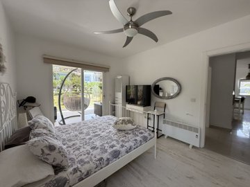 An immaculate Garden Apartment In Bodrum For Sale - Bedroom with terrace access