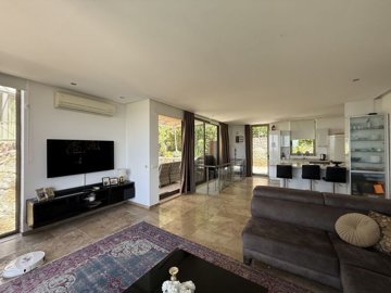 Award-Winning Bodrum Property For Sale In Yalikavak - Lounge to the kitchen and covered terrace