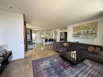 Award-Winning Bodrum Property For Sale In Yalikavak - Furnished lounge to the fully fitted kitchen