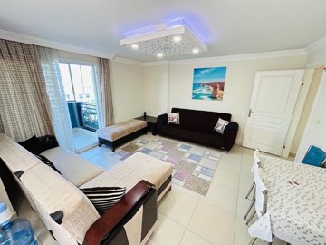 Sea View Apartment For Sale In Hisar, Didim - Furnished lounge