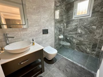 A Serene Investment Property In Fethiye For Sale - Apartment's main shower room