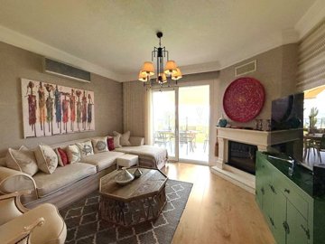 Luxurious Seafront Property For Sale In Kadikalesi, Bodrum - Lounge with fireplace and terrace