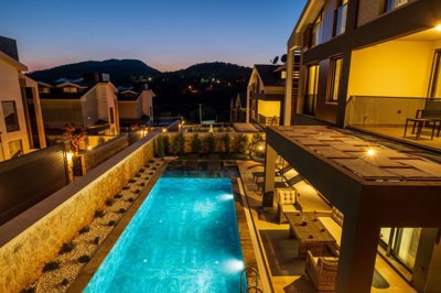 Key-Ready Investment Property For Sale In Ovacik, Fethiye - Ambient lit terrace
