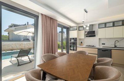 Key-Ready Investment Property For Sale In Ovacik, Fethiye - Dining area with terrace access