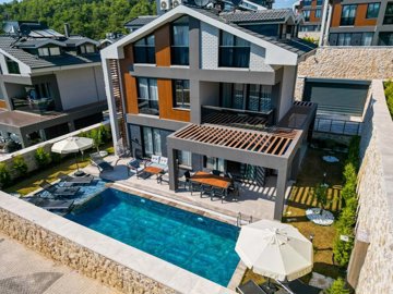 Key-Ready Investment Property For Sale In Ovacik, Fethiye - Secure gated parking to the rear