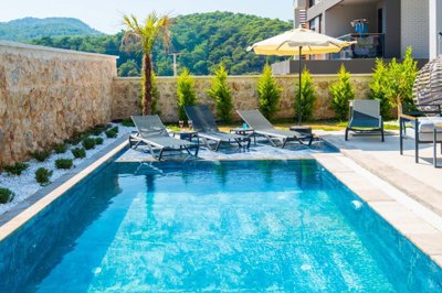 Key-Ready Investment Property For Sale In Ovacik, Fethiye - A large private pool