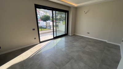 Smart Home Marmaris Property For Sale - Lounge with balcony access