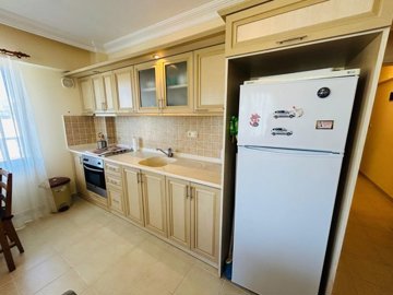 Unmissable Apartment For Sale In Hisar, Didim - Fully fitted kitchen with white goods