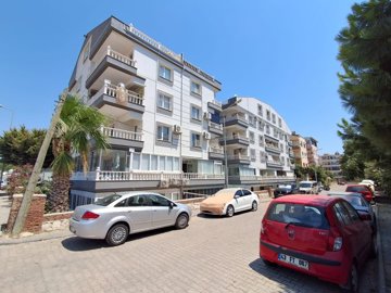 Unmissable Apartment For Sale In Hisar, Didim - View to the block from the street