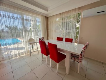 Meticulous Fethiye Property For Sale – Dining area with pool views