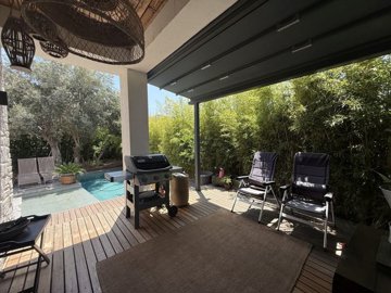 A Tranquil Duplex Yalikavak Property For Sale - Covered terrace near the pool