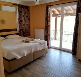 Sprawling Triplex Fethiye Villa For Sale In Ovacik - Second double bedroom with shared balcony