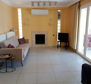 Sprawling Triplex Fethiye Villa For Sale In Ovacik - Lounge with fireplace