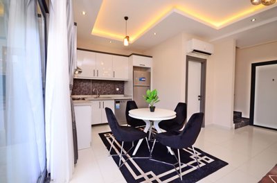 Duplex Garden Apartment For Sale In Alanya - Dining area and kitchen