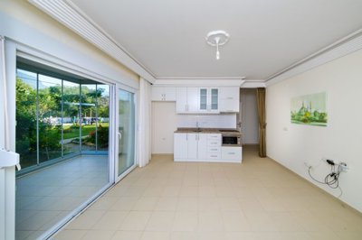 Delightful Ground-Floor Apartment For Sale In Alanya – Lounge area to the kitchen