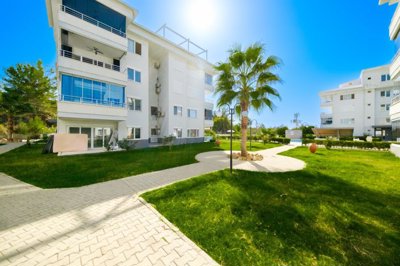 Delightful Ground-Floor Apartment For Sale In Alanya – Pretty landscaped gardens