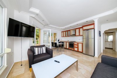 A Must-See Hillside Property With Nature Views For Sale In Alanya - Lounge to the kitchen