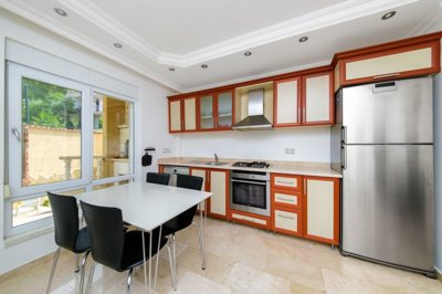 A Must-See Hillside Property With Nature Views For Sale In Alanya - Kitchen and dining area