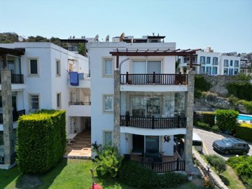 A Sea & Nature View Apartment In Bodrum For Sale - Main view of the apartment building